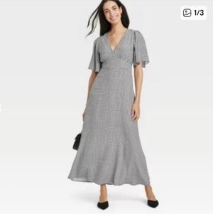 Elegant Black and White Women's Dress.  Size 14. New